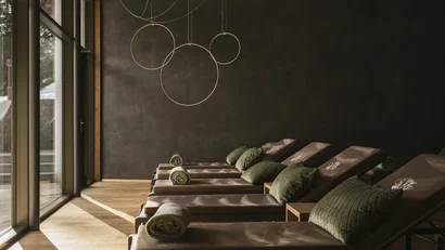 Relax room with lounge chairs and snowy outdoor view